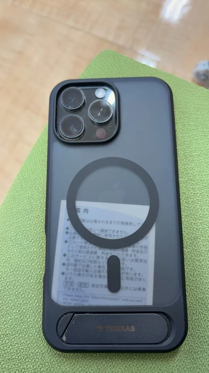 19 October 2026: the collected iPhone in its dark TORRAS case.